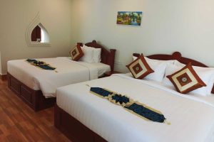 Suite Room at Sing Angkor Boutique Hotel Siem Reap - 1 king size bed with 1 queen size bed